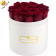 Roses Éternelles Rouges Dans Une Flowerbox Ronde Blanche