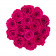 Růžové věčné růže v béžovém semišovém flowerboxu
