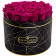 Růžové věčné růže ve velkém černém industrial flowerboxu